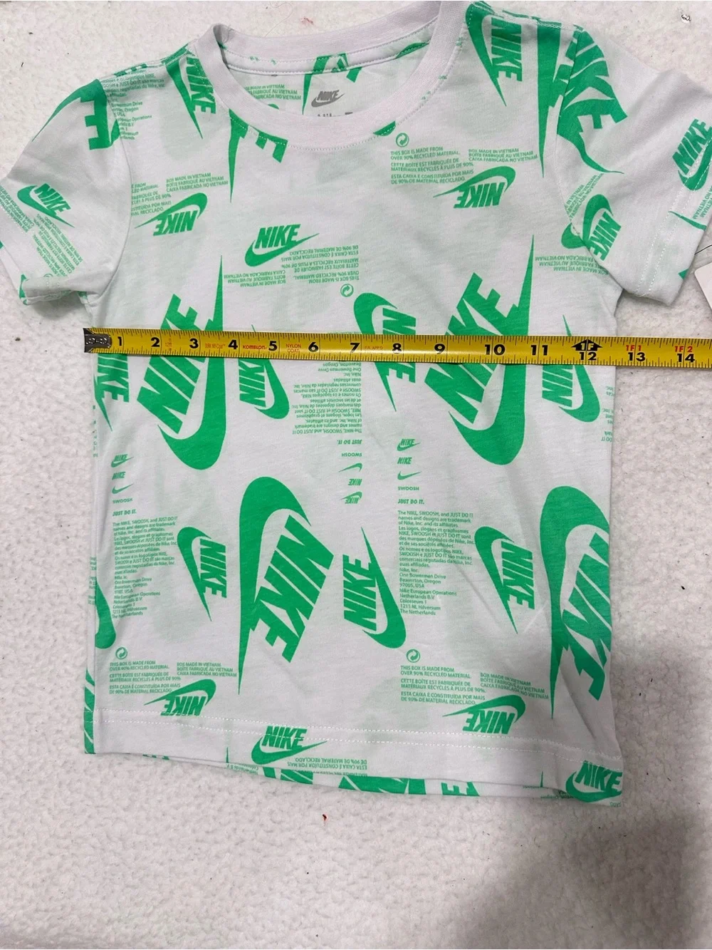Boy’s Nike White Tee with Bright Green Allover Logo Print